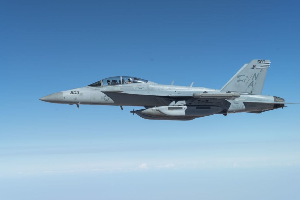 A U.S. Navy EA-18G Growler assigned to Electronic Attack Squadron (VAQ) 139, deployed aboard the aircraft carrier USS Nimitz (CVN 68), flies over the U.S. Central Command area of responsibility, Sept. 30, 2020. VAQ-139 is assigned to Carrier Air Wing 17, deployed aboard the aircraft carrier USS Nimitz (CVN 68), flagship of Nimitz Carrier Strike Group. The EA-18G has an array of sensors and weapons that provide the warfighter with the ability to counter current and emerging threats. (U.S. Air Force photo by Staff Sgt. James Merriman)